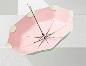 Close-up interior of pink and mint green automatic folding parasol with sturdy frame