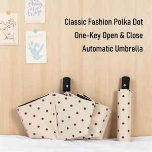 Elegante ombrello automatico pieghevole a pois beige con pulsante di apertura facile