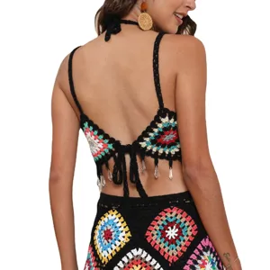 Hand crocheted black halter bikini top with colorful granny squares and cute fringe details.