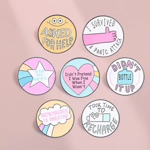 Collection of seven healing mental health enamel pins with supportive English quotes