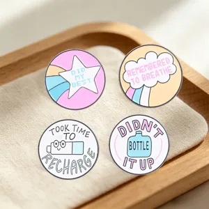 Set of four macaron-colored mental health healing enamel pins with inspirational quotes
