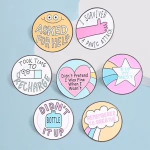 Set of seven macaron colored mental health healing enamel pins with inspirational quotes