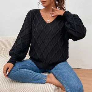 Detailed view of a stylish black v-neck cable knit sweater for women, comfortable fit.