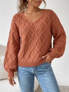 Close up view of women V-neck cable knit sweater, textured long sleeve pullover knitwear.