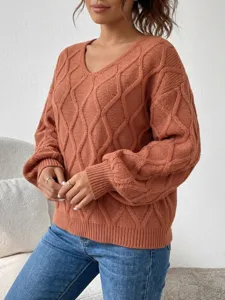 Detailed view of a stylish V-neck cable knit sweater for women, comfortable loose casual fit.