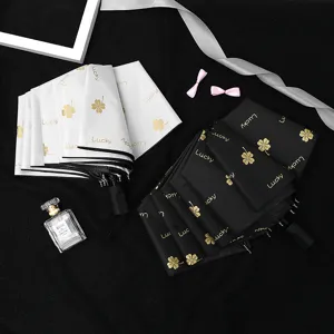 Three-fold Anti-UV Parasol With Black Glue Coating Lucky Clover Pattern Pongee Fabric Sun And Rain Umbrella Foldable Portable Eight-Rib Manual Umbrella For Adults