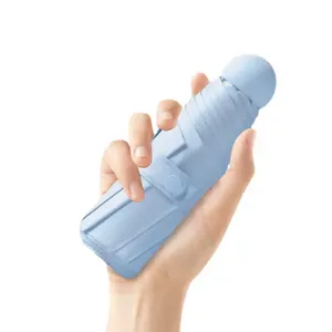 Mini capsule umbrella, ultra-light portable folding sun umbrella for women UV protection.
