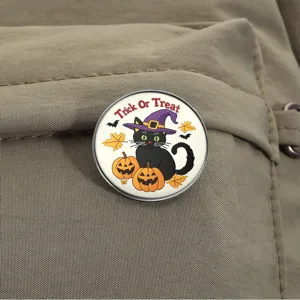 Circular Halloween metal badge featuring a black cat with a witch hat on tan fabric