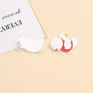 Ensemble de pin's émaillés drôles avec canard musclé et canard mordu d'un anneau