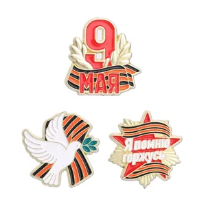 Victory Day metal brooches featuring peace dove and Saint George ribbon designs