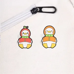 Cute cartoon fruit duck enamel pins set, apple and orange ducklings on white canvas bag