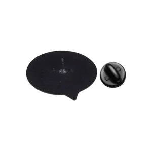 Detail view of the back of a black speech bubble enamel pin with rubber clutch.