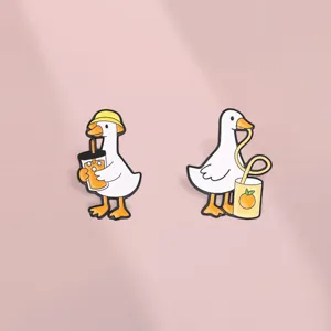 Set of cute cartoon white goose enamel pins drinking juice for bag and clothing decor.