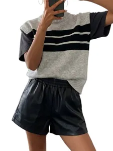 Casual striped knit vest for women with mock neck and black faux leather shorts set.