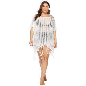 Detailed full view of white hollow-out crochet beach cover-up on a plus-size model
