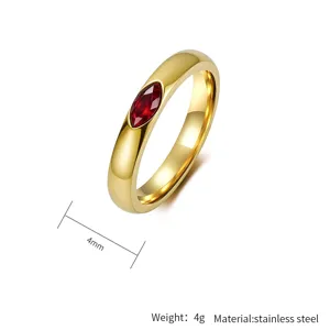 Detailed view of 4mm stainless steel ring with marquise cut red gemstone inlay
