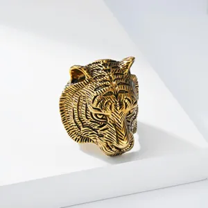 Detailed view of the gold titanium steel tiger head ring, showcasing bold vintage style.