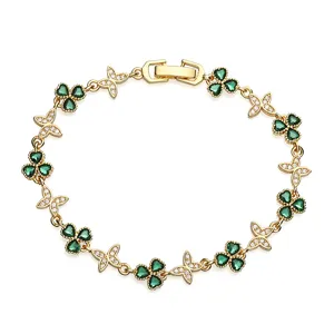Elegant gold-plated clover and butterfly bracelet with green and white cubic zirconia stones