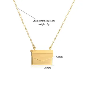 Detailed view showing dimensions of a vintage envelope-shaped gold locket necklace