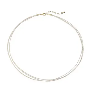 Close-up of three-layer hand-woven cord choker with gold adjustable clasp extension.
