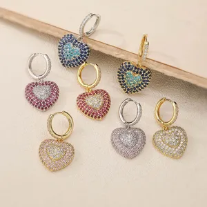 Macro view of colorful double heart hoop earrings with exquisite cubic zirconia pave