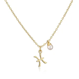 Detailed view of a gold-plated Pisces zodiac necklace with a single white pearl charm