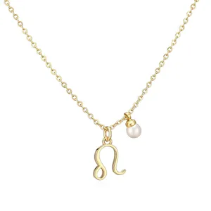 Close-up of gold-finish Leo zodiac necklace with a white pearl charm on white background