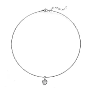 Detailed view of a sparkling heart-shaped zirconia pendant on a silver stainless steel choker