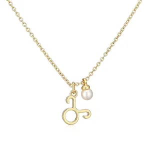 Close-up detail of a gold Taurus zodiac pendant necklace with a white pearl charm