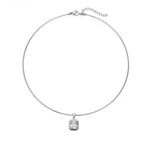 Close-up of a silver-tone stainless steel choker featuring a rectangular zircon pendant