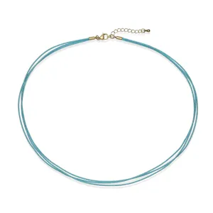 Detailed view of sky blue triple-layer hand-woven string choker with gold adjustable clasp