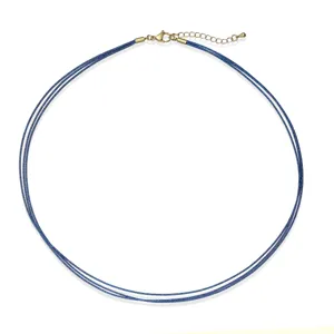 Detailed view of blue triple-layer hand-woven necklace cord with gold lobster clasp