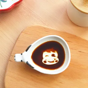 Cute ceramic soy sauce dish with animal shape, perfect for sushi, sauce, and cute table decor.