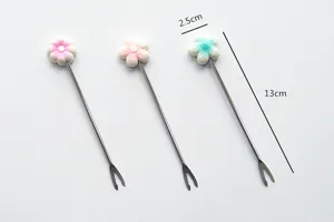 Stainless steel fruit fork detail showing cute flower handle design and exact dimensions.