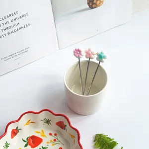Stainless steel fruit forks with cute flower handles for dessert and daily dining use.