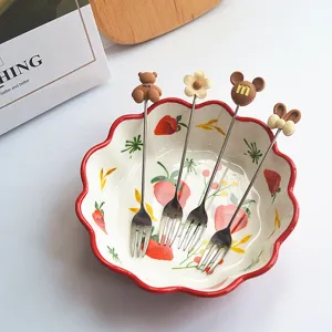 Cute stainless steel fruit forks set with sweet dessert designs, perfect for cakes and parties.