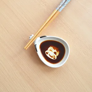 Japanese style ceramic soy sauce dish with cute animal shape and wooden chopsticks set.