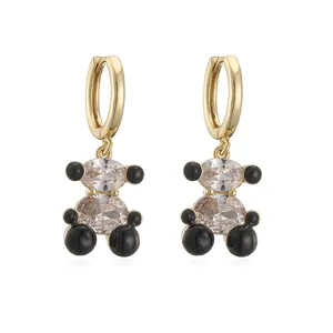 Boucles d'oreilles ours avec zircon étincelant et finition émail noir en or.