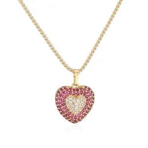 Close-up detail of a double heart pendant necklace with red and white sparkling crystals