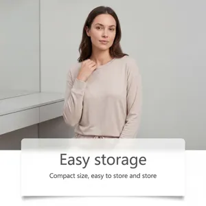 Elegant woman in beige loungewear at a white vanity table for compact product storage