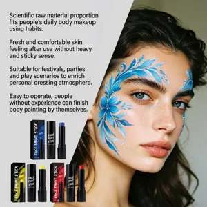 Stick per trucco viso vivaci mostrati con modella e body art floreale blu elaborata