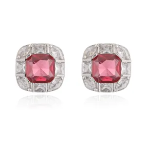 Detailed view of elegant square stud earrings with pink gemstone and clear crystals.