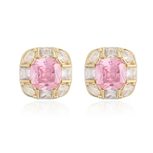 Detailed view of 18K gold plated square stud earrings with pink gemstone.