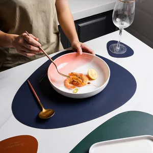 Modern irregular heat-resistant leather placemat and coaster set for dining table decor