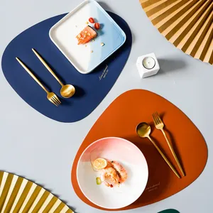 Irregular leather placemats with waterproof heat-resistant surface for home dining