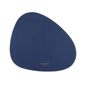 Minimalist navy blue irregular leather placemat with waterproof heat insulation design