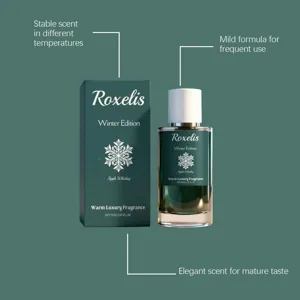 Vue rapprochée du flacon et de l'emballage du parfum Roxelis Apple Whiskey Winter