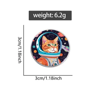 Macro view of a circular metal badge featuring a cat astronaut with size measurements