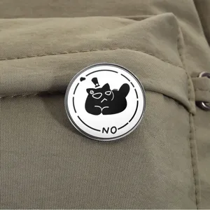 Detailed close-up of a circular metal cat badge with 'NO' text on a backpack