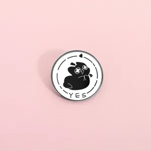 Mystic game themed round enamel pin with cute black cartoon character and YES text